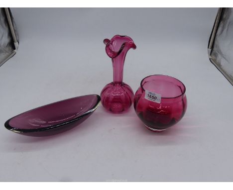 A Dartington cranberry glass Bowl with inner vertical ribs and clear base, unsigned, 4 3/4" tall x 5" wide, along with a simi