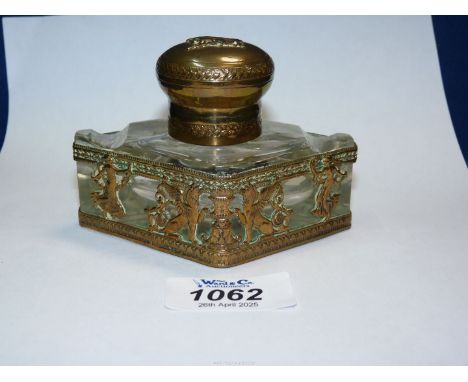 A French empire style Inkwell, in cut glass mounted with gilt bronze, classical figures and griffin design.