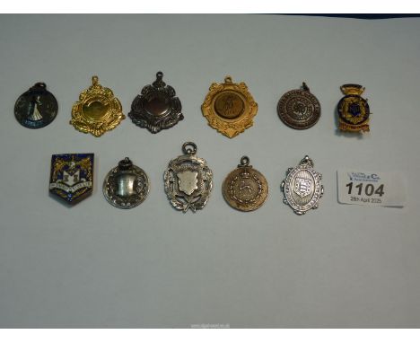 A silver medal/fob and others to include: one for "The Royal Berkshire Regiment", "Herefordshire football league 1921, etc.