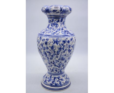 A large Portuguese ceramic baluster vase hand painted with blue trailing flowers, 19" tall.