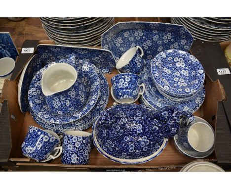 A quantity of "Calico" pattern tea/breakfast to include: a hen-on-nest, cups and saucers, plates, etc.