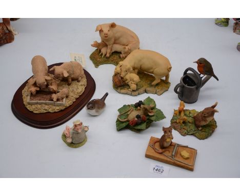 A quantity of figures to include: Leonardo pig family on plinth, Aynsley mouse figures, wren and robin on watering can, etc.