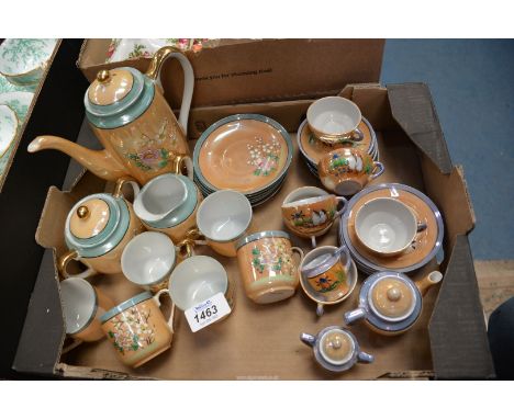 Two six piece Japanese teasets, one marked "Foreign" to the base and including teapot, sugar bowl and creamer, etc. and the o