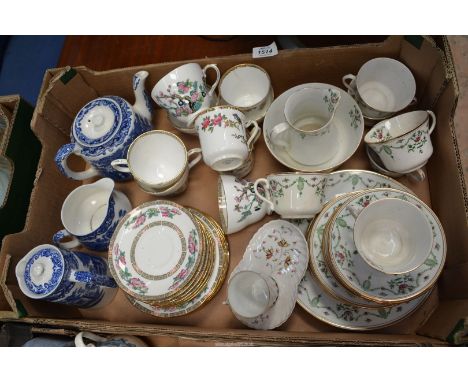 A quantity of part tea sets and an Abbey tea pot, hot water pot and a milk jug.
