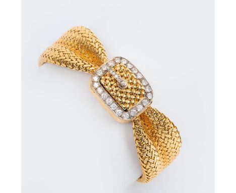 Ebel. Damen-Armbanduhr. Um 1960. 18 kt. GG mit WG, gest., ziseliert, poliert, Ebel-Uhr Handaufzug, Armband MZ: SF. Besatz mit