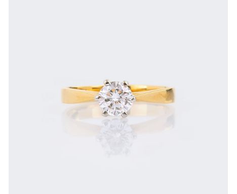 Solitär-Ring. 14 kt. GG mit WG, gest. In Krappenfassung ca. 0,50 ct. Weiß(H).P. (ca. 5.2 x 3 mm). Weite 50, Gew. ca. 2,1 g.  