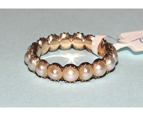 A Victorian yellow gold pearl full-eternity mourning ring set seventeen demi-pearls, unmarked, size K, 2.5g. 