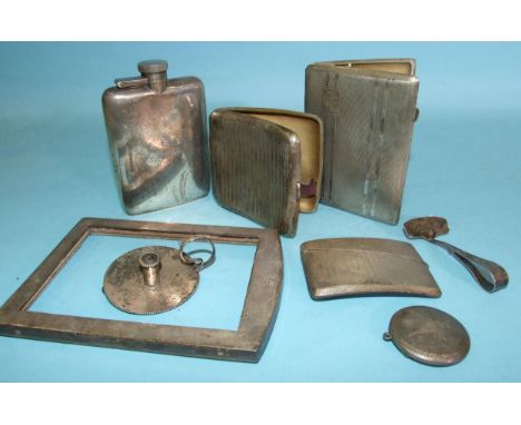 A George V silver whisky flask, 12 x 8cm, Birmingham 1915, with inscription, a silver card case 8.5 x 6cm, Birmingham 1927, t
