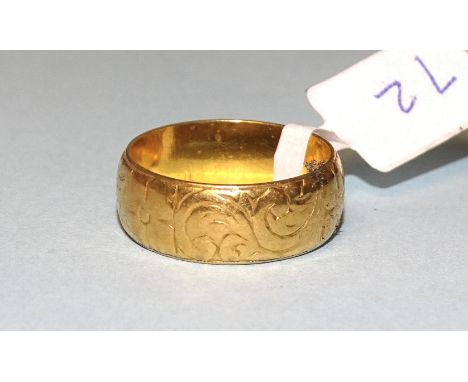 A 22ct gold wedding band, size K, 5.6g. 