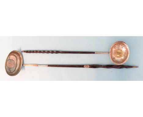 A silver toddy ladle with silver-mounted baleen handle and inset Charles I shilling in plain bowl and another with 1788 Carlo
