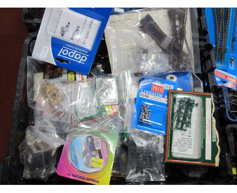 A Quantity of Trackside Scenic Items, packaged and loose, people, animals, lamp posts and telegraph poles, fencing, small bui