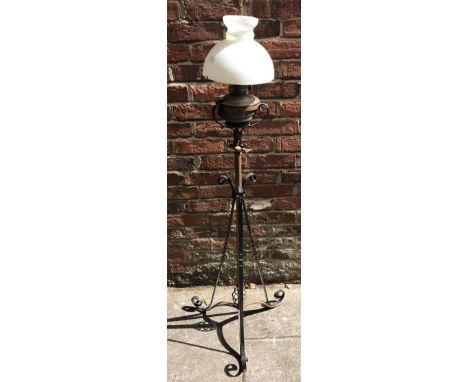 An Arts &amp; Crafts painted, wrought iron telescopic standard oil lamp/jardiniere stand, with 'Super Aladdin' oil lamp inser