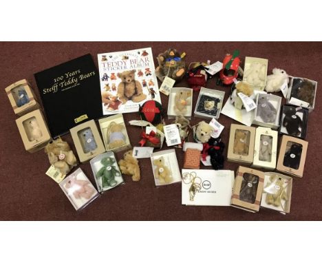 Twenty eight small Steiff bears including Christmas ornaments and historic miniatures, together with a book '100 Years Steiff