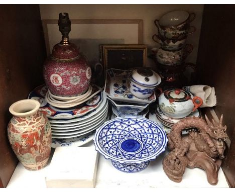 SECTION 19. A quantity of mixed Oriental ceramics including a dragon, lamp, vase, blue and white dish etc. 