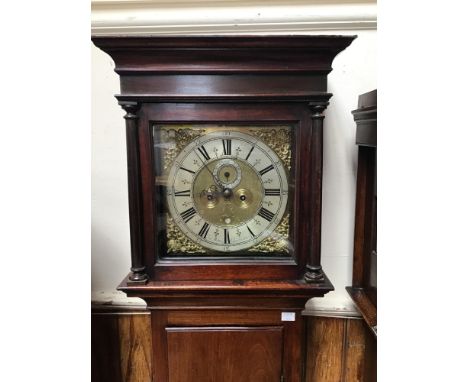 An 18th century oak cased eight-day longcase clock, brass face with embossed spandrels and silvered chapter ring, Roman numer