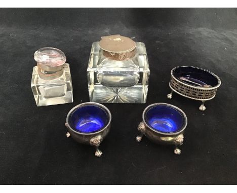 A silver-topped square glass inkwell (lid af), London, 1914, together with a smaller inkwell, a silver open salt with blue gl