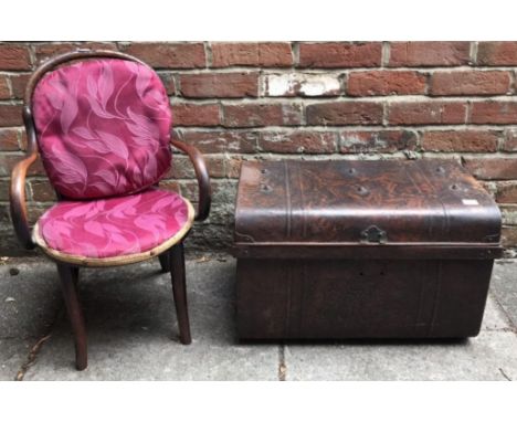 A child's Bentwood chair, with later upholstered seat and cushion, together with a wood-effect painted trunk, 60cm wide 