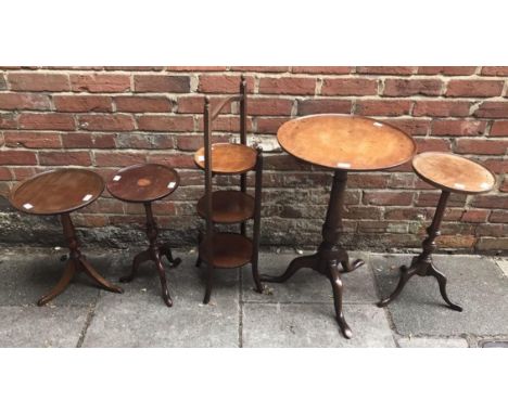 Four various mahogany tripod occasional tables with circular tops, together with a folding cake stand 