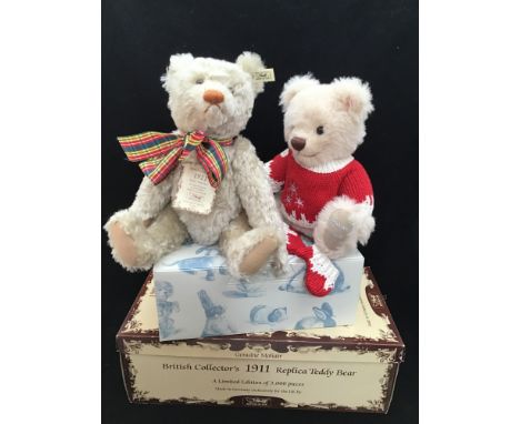 Two Steiff bears including 1911 replica bear, blonde hair, gold button no. 406645, limited edition 811/3000, and a blonde bea