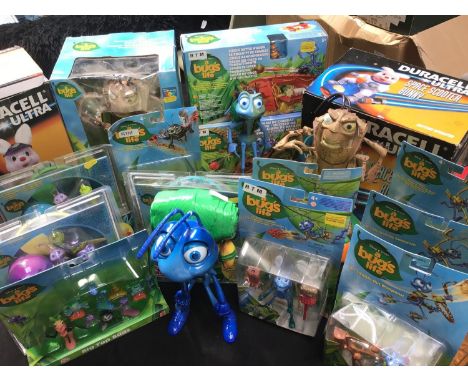 A quantity of Disney Pixar 'A Bug's Life' toys including Circus Battle Wagon, talking Room Guard, some loose figures and two 