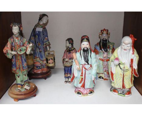 SECTION 13.&nbsp; A set of three ceramic Oriental ladies in varying poses (one lacking fingers on one hand), together with th
