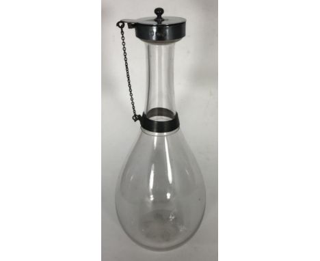 A Victorian silver double collared water carafe, with glass pear shaped body and star-etched base, hallmarked Sheffield, 1893