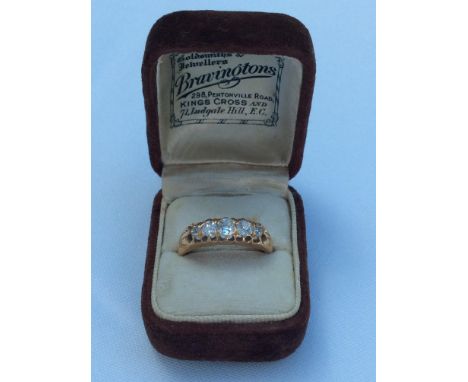 A lady's 18ct yellow gold victorian cut diamond ring, set with five diamonds in a gallery setting.  Estimated weight of diamo