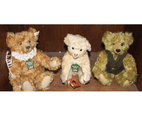 SECTION 48.  Three limited edition Steiff musical bears including 'The Poet', tan fur, plays Bach, no. 653186 and 'Howard', d