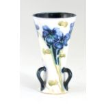 JAMES MCINTYRE & CO, BURSLEM A FLARED THREE HANDLED MINIATURE CABINET VASE DESIGNED BY WILLIAM