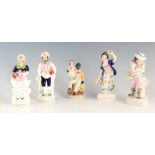 A PAIR OF 19TH CENTURY STANDING STAFFORDSHIRE FIGURES of Spring and Winter 21.5 and 21cm high