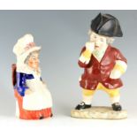 AN OVERSIZED STAFFORDSHIRE STANDING FIGURE OF A SNUFF TAKER the well dressed portly figure wearing a