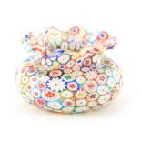 AN ITALIAN MILLEFIORI GLASS VASE of squat bulbous form with crimped rim 9cm high, 15cm diameter