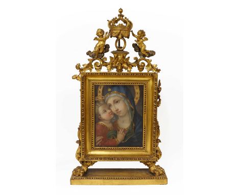 Florentine School, 19th centuryMadonna and Childoil on canvas27.5 x 20.7cm, in the original carved giltwood frame, surmounted