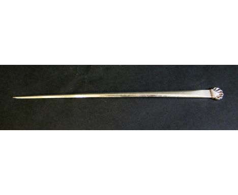 A Georgian London Silver Skewer with scallop shell finial, 24.5cm, probably Thomas Wallis I, 39g. Date letter rubbed 