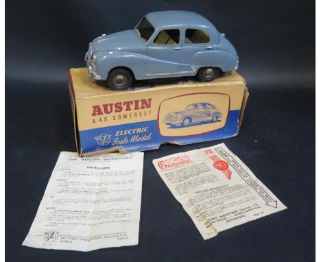 A Victory Industries Austin A40 Somerset Electric  1/18 Scale Model. Model is good has damage to right rear. Box is good with