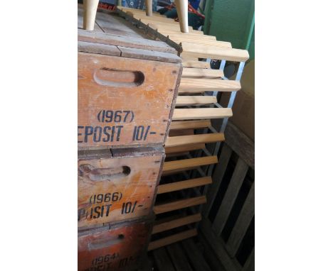 A Wine Rack and small steamer trunk 