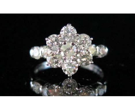 A 2ct Diamond Floral Cluster Ring in a .950 platinum setting, 13mm head, size Q.5, 7g 