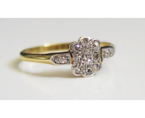 An 18ct Gold and Diamond Ring, size O, 2.1g 