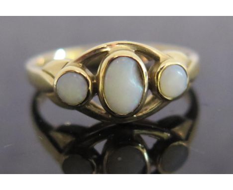 A 9ct Gold and Opal Three Stone Ring, size M, 2.3g. A/F 