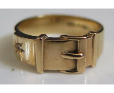 A 9ct Gold and Diamond Buckle Ring, size Q.5, 5g 