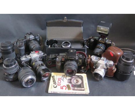 A Canon EOS3 35mm SLR Camera, Canon T90, Minolta XD7, Kodak Reflex III, Sigma 10-20mm 1:4-5.6 DC HSM lens and Sigma 400mm 1:5