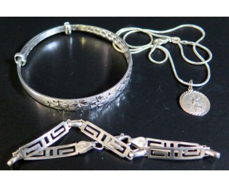 An Adjustable Silver Bangle, silver St. Christopher pendant necklace and silver bracelet, 29g 