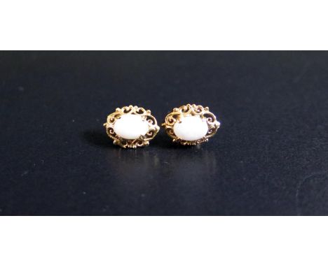 A Pair of Hallmarked 9ct Gold and White Opal Stud Earrings (12x9mm), 1.2g 