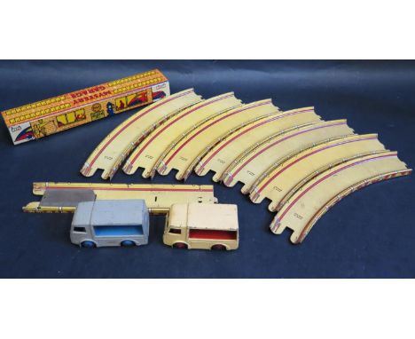 A Marx Tinplate Litho Mystery Garage (GT. Britain) two track pieces missing and Two Dinky No. 30V Electric Vans 