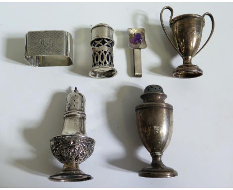 Three Hallmarked Silver Peppers, engine turned silver napkin ring, small silver two handled presentation cup and Mexican silv