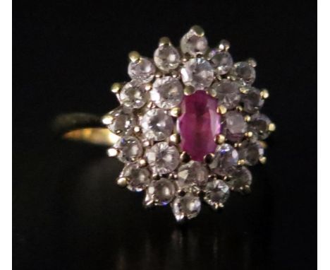 A 9ct Gold, Pink Sapphire and Diamond Cluster Ring, size O.5, 2.9g 