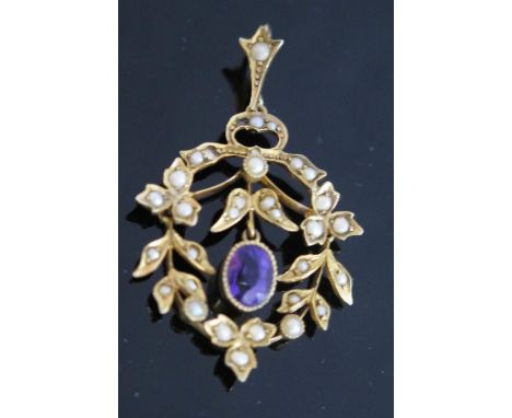 A 9ct Gold, Amethyst and Pearl Pendant with hinged lower part, c. 38mm drop, 2.8g. Two pearls missing 