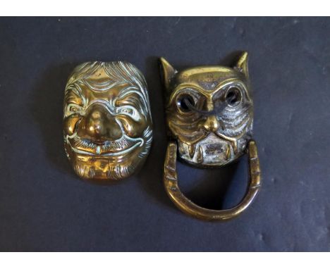 A Small Brass Mask (5.5cm) and door knocker 