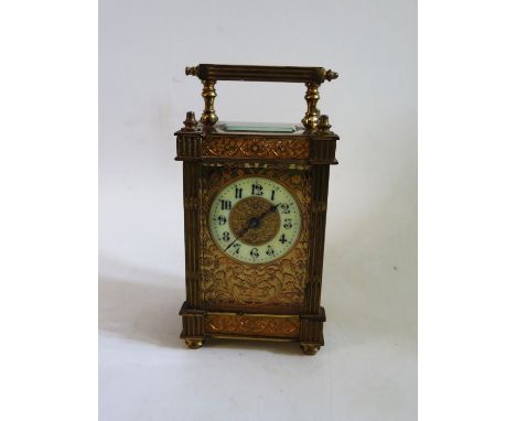 A Gilt Carriage Clock, 15cm, running 