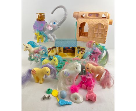 A collection of Hasbro My Little Pony figures, accessories and playset together with other toys from that era. Lot includes 1